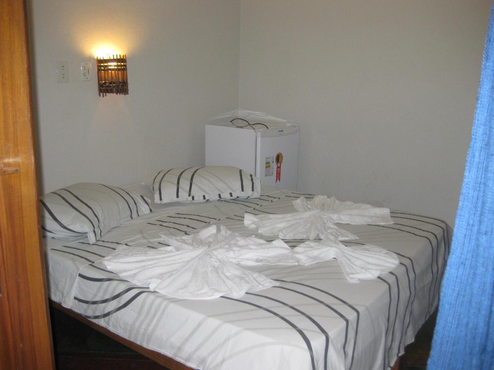 O Pharol Hostel E Pousada 伊塔卡雷 外观 照片