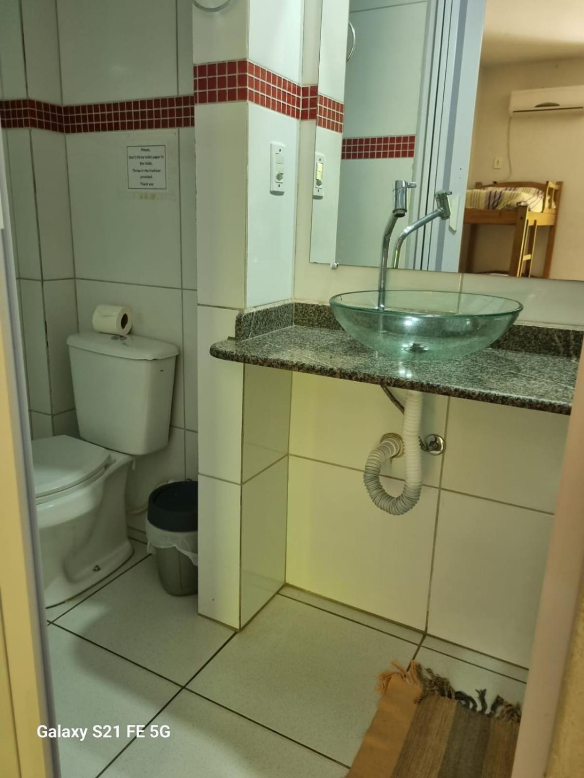 O Pharol Hostel E Pousada 伊塔卡雷 外观 照片