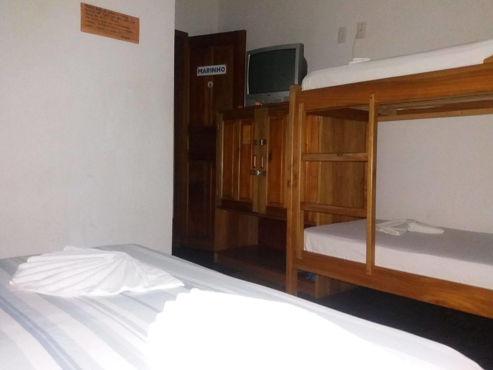 O Pharol Hostel E Pousada 伊塔卡雷 外观 照片