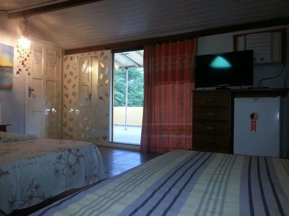 O Pharol Hostel E Pousada 伊塔卡雷 外观 照片