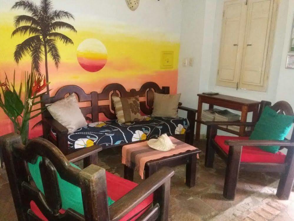 O Pharol Hostel E Pousada 伊塔卡雷 外观 照片