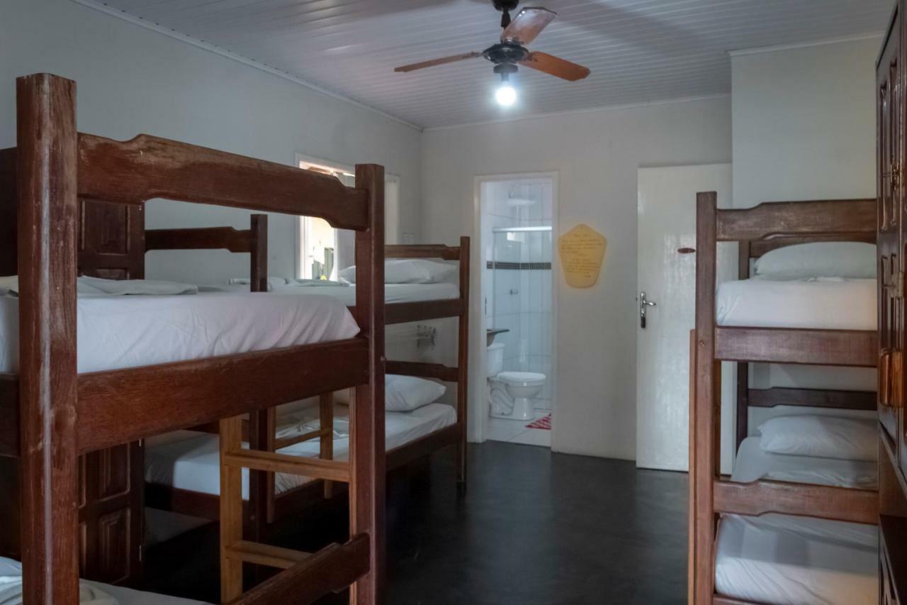 O Pharol Hostel E Pousada 伊塔卡雷 外观 照片